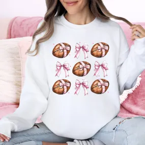 Girly Footballs With Bows on White Gildan Heavy Blend Sweatshirt