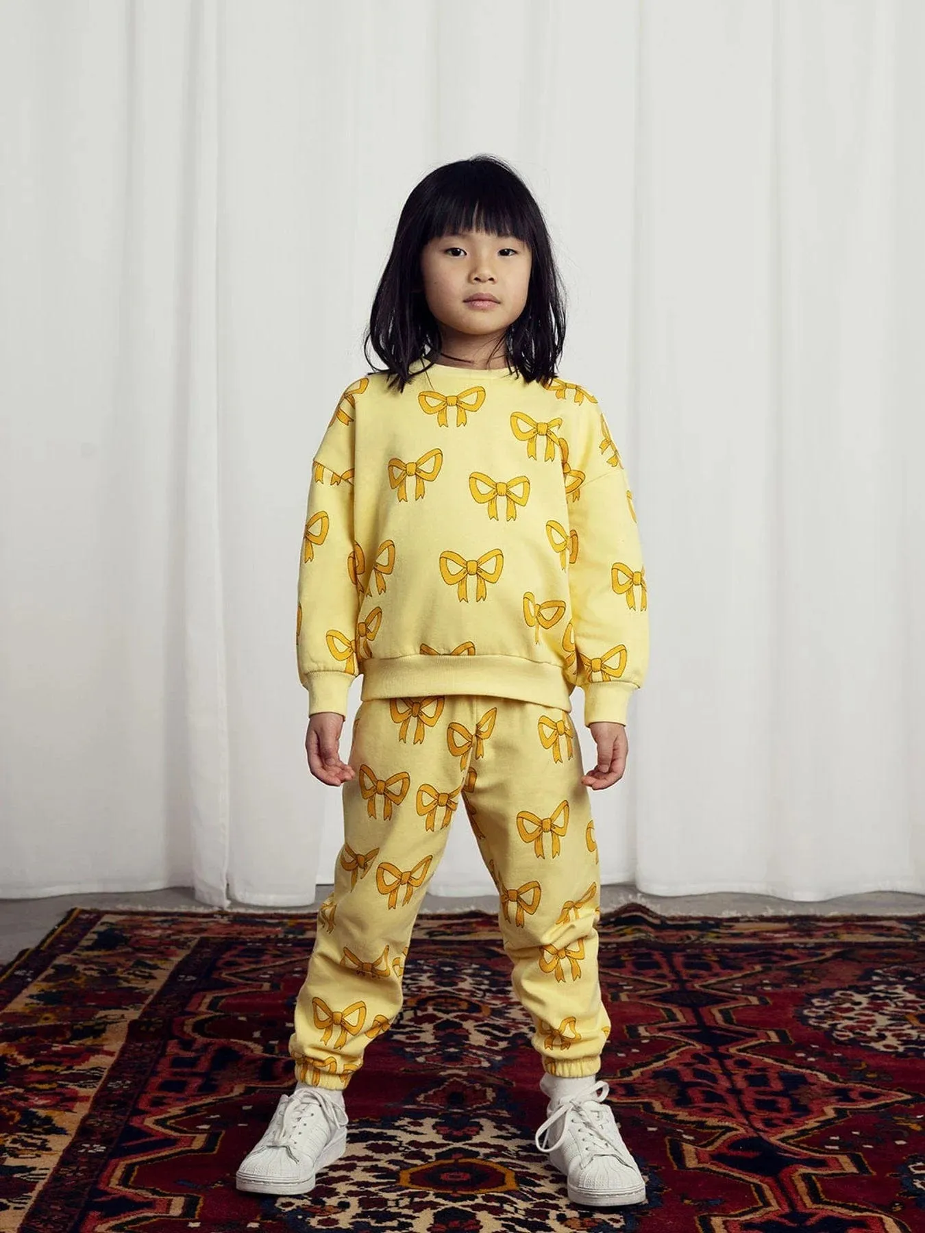 Mini Rodini Girls Bow Sweatshirt in Yellow